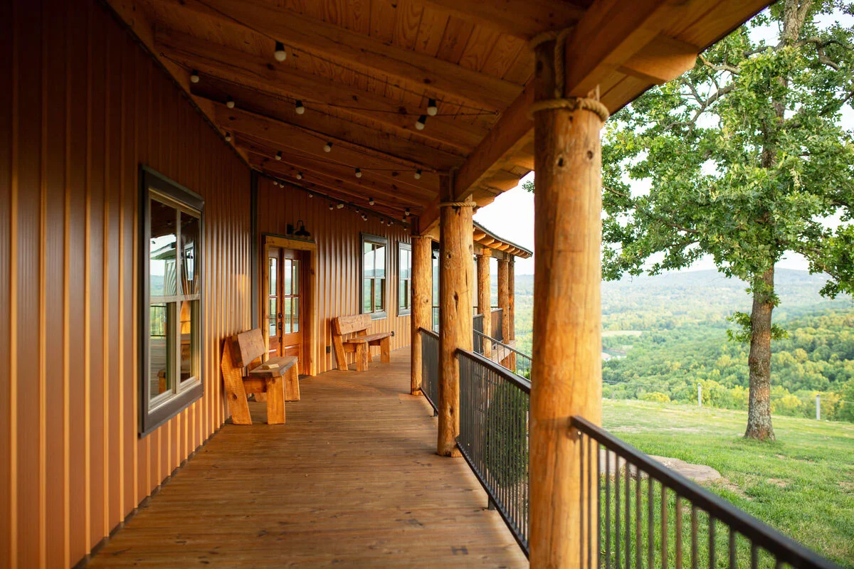 porch at ponderosa mountain venue with cedar accents and copper colored metal siding