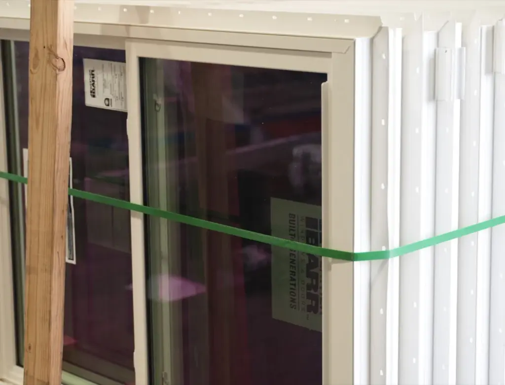 a bundle of windows at the signature steel shop available for customers to use on their construction projects.
